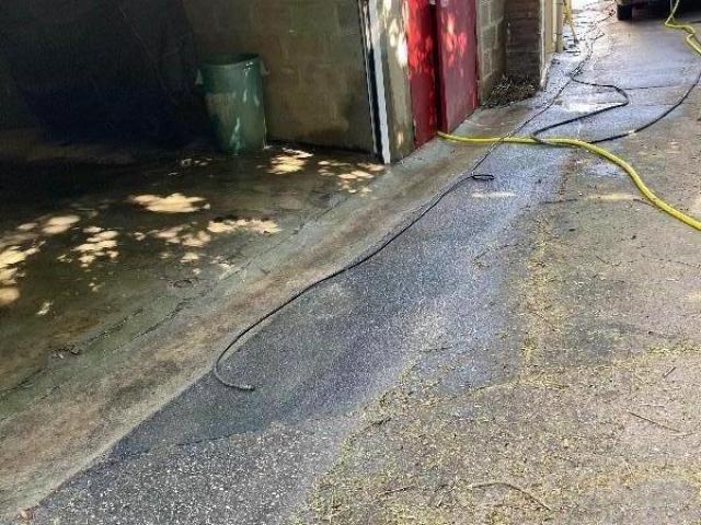 Dégorgement du réseau Eau Usée intérieur dans un garage au sein d'une résidence à Caen dans le Calvados