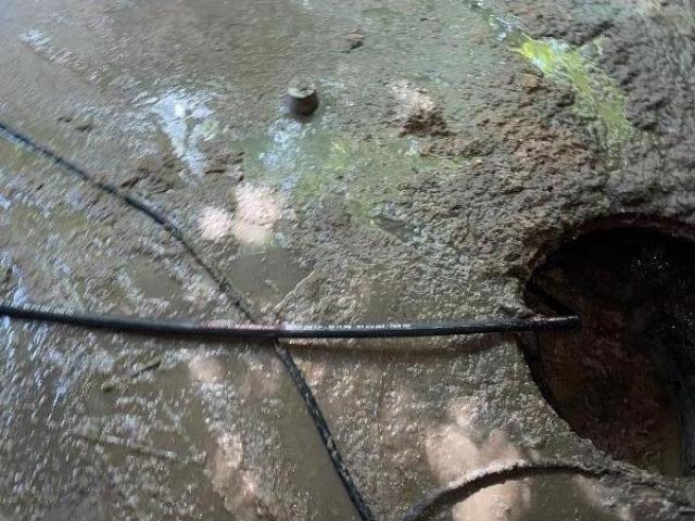 Dégorgement du réseau Eau Usée intérieur dans un garage au sein d'une résidence à Caen dans le Calvados