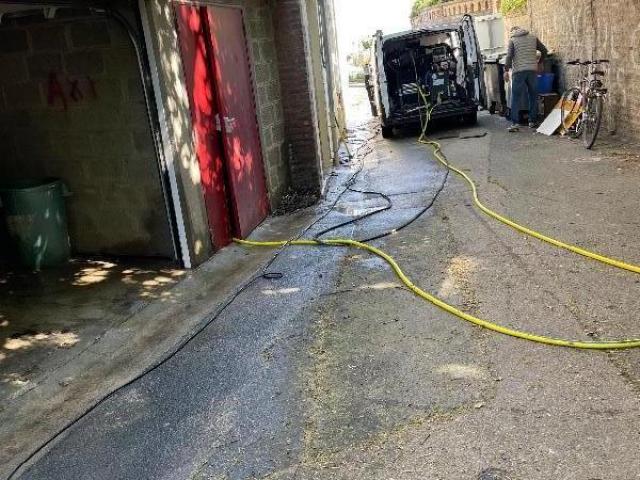 Dégorgement du réseau Eau Usée intérieur dans un garage au sein d'une résidence à Caen dans le Calvados